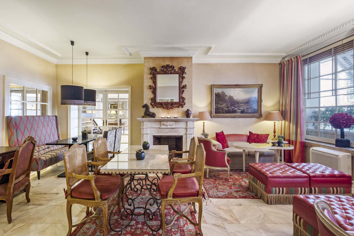 a room with a fireplace and a table
