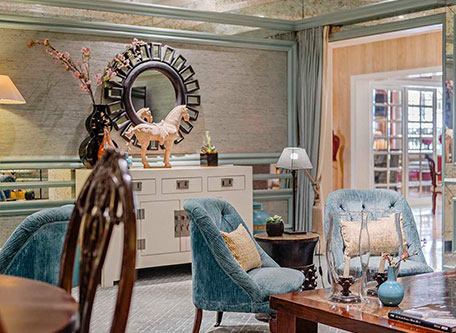 a room with a table and chairs