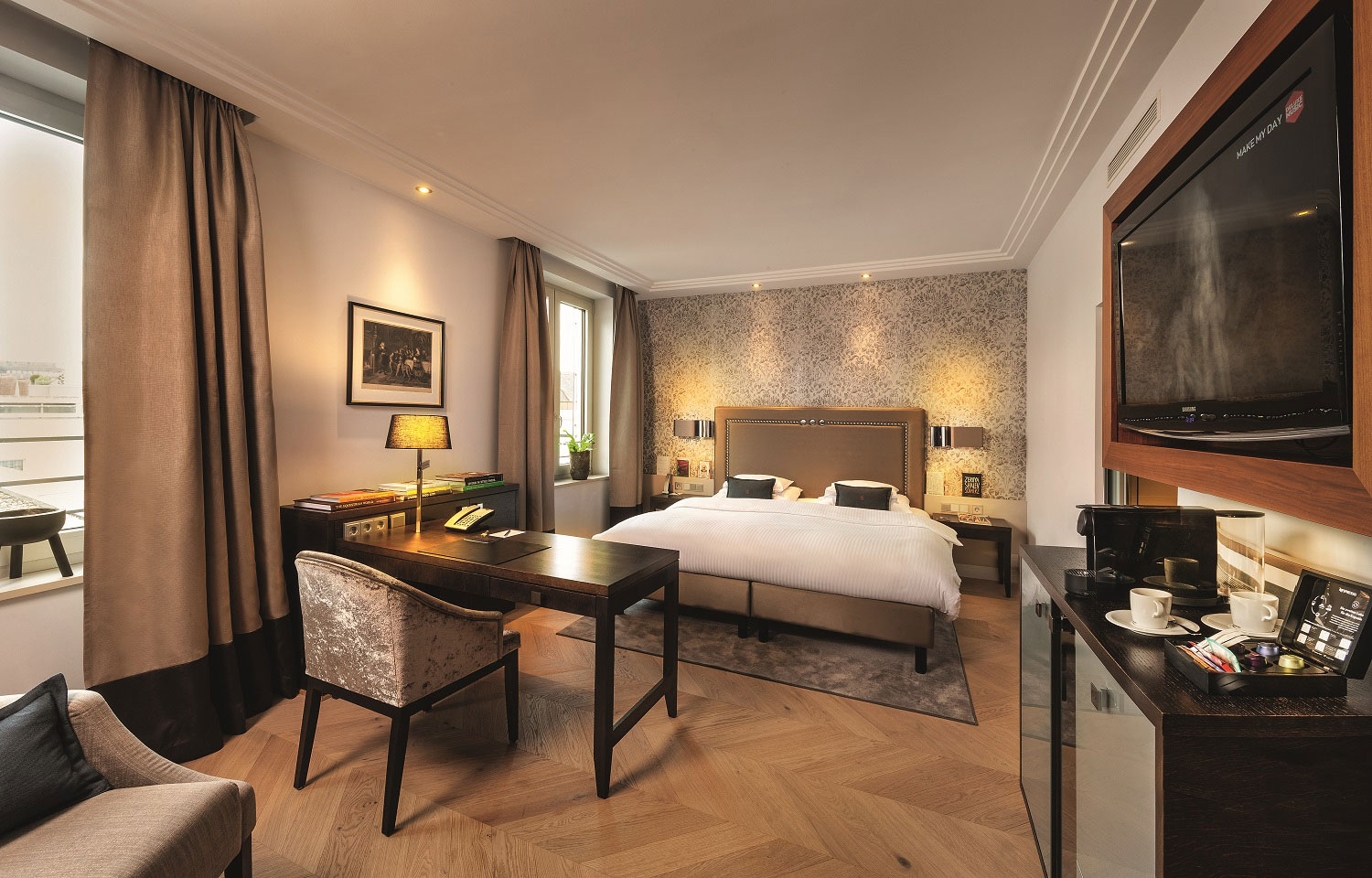 a room with a bed and a desk