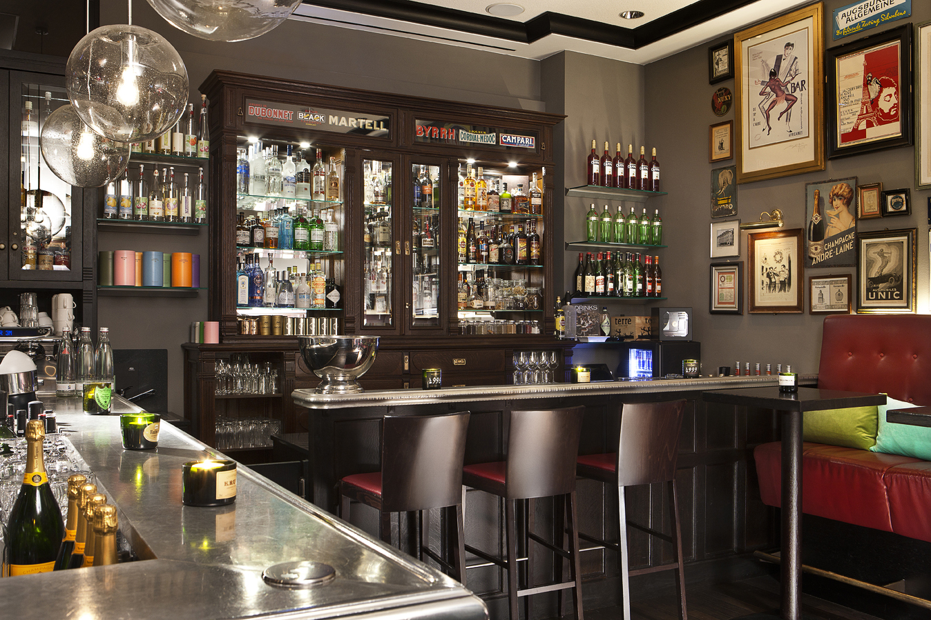 a bar with bottles and glasses
