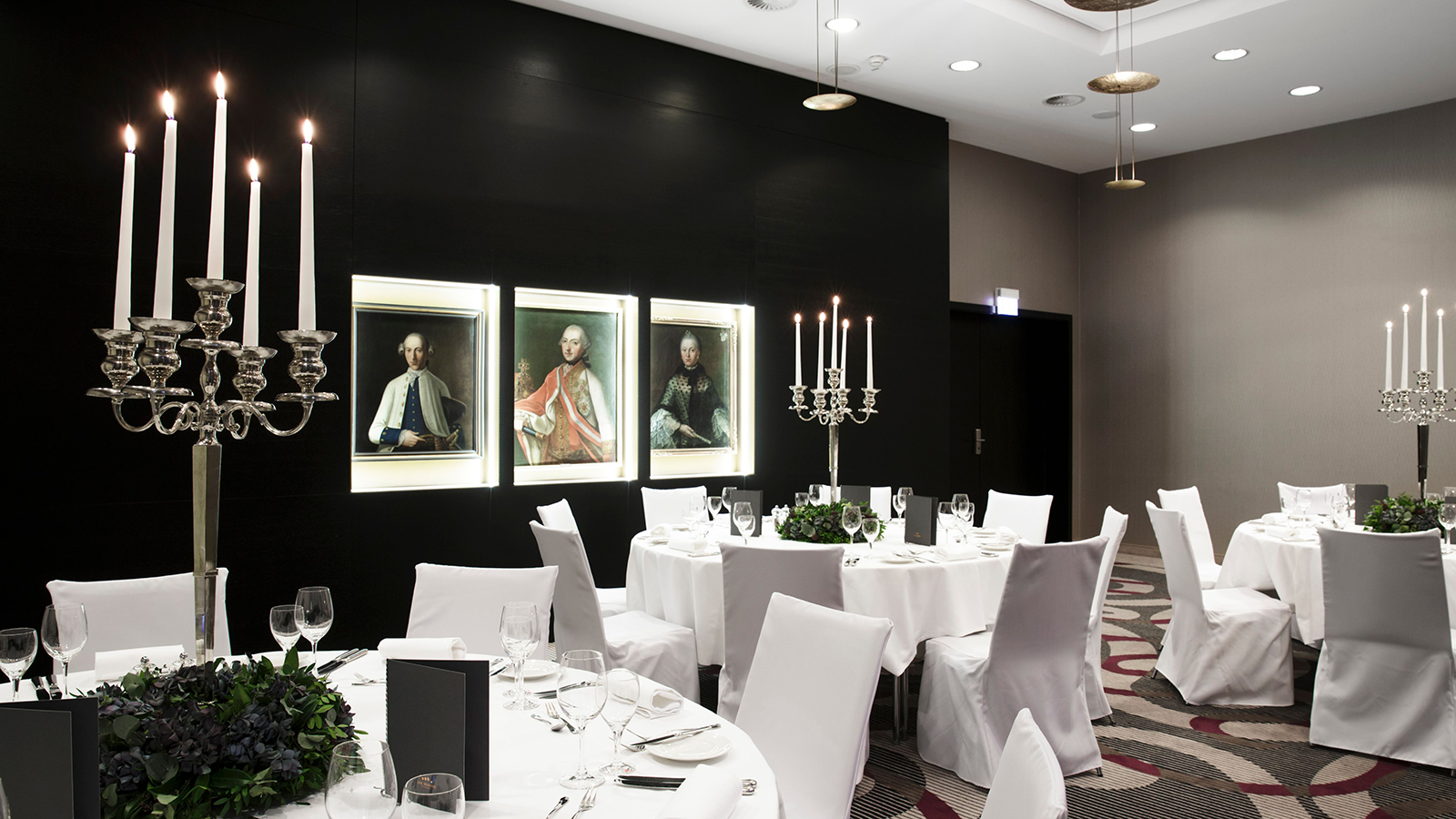 a room with tables and chairs