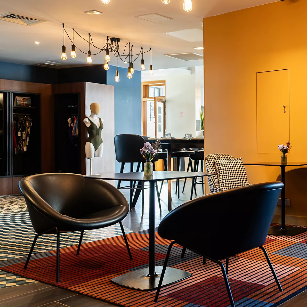 a room with chairs and a table
