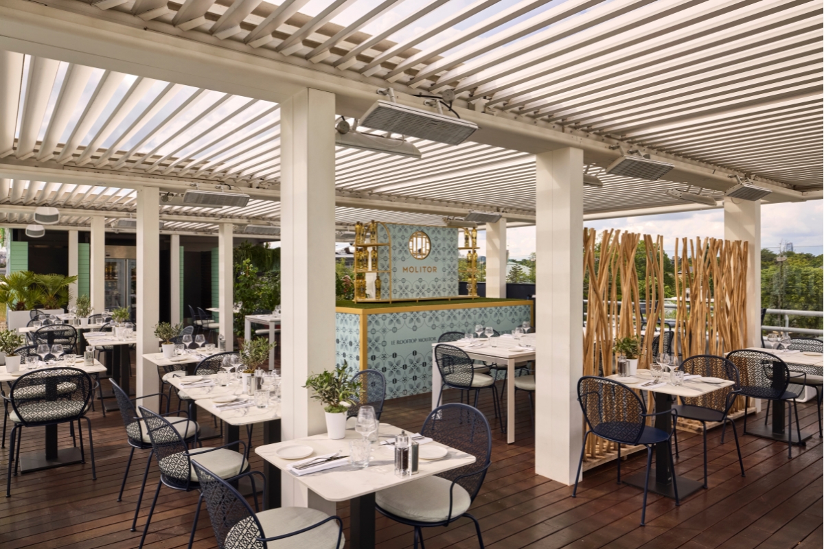 a restaurant with tables and chairs