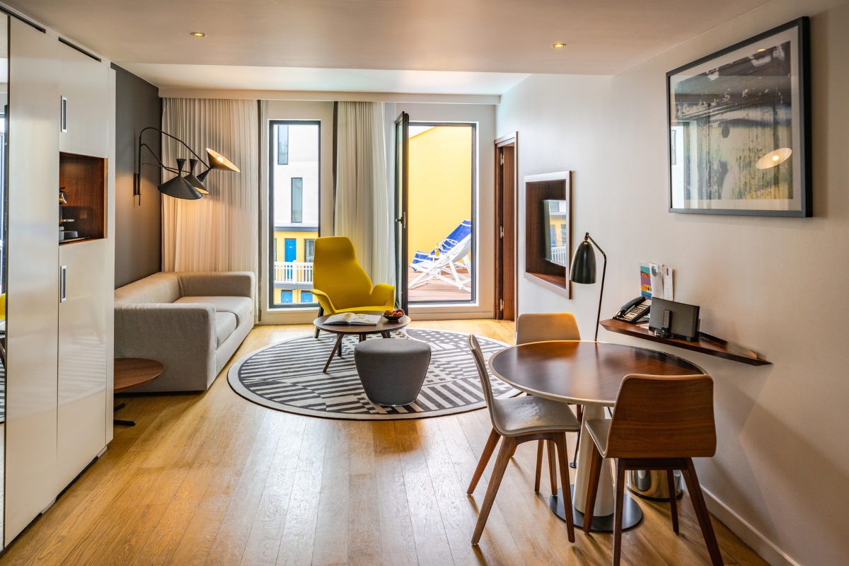 a room with a table and chairs