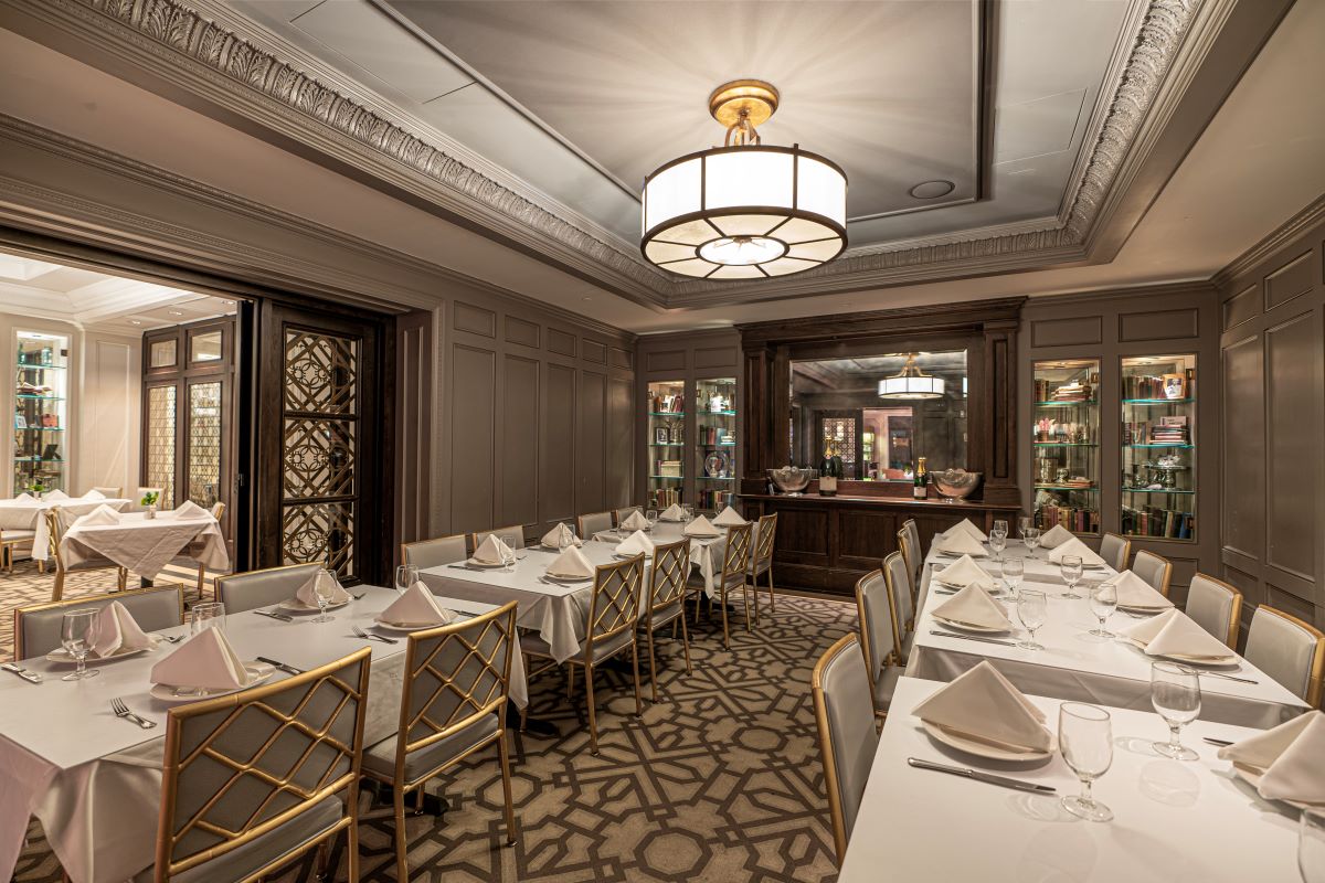 a room with tables and chairs
