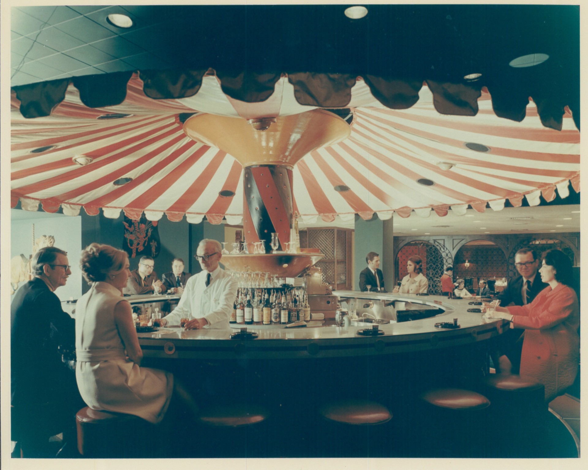 people sitting at a bar