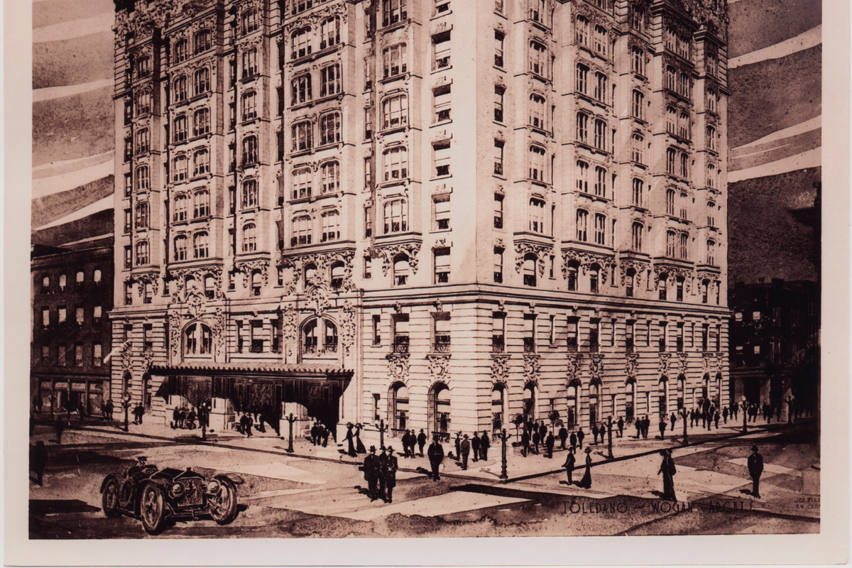 a large building with people walking in front of it