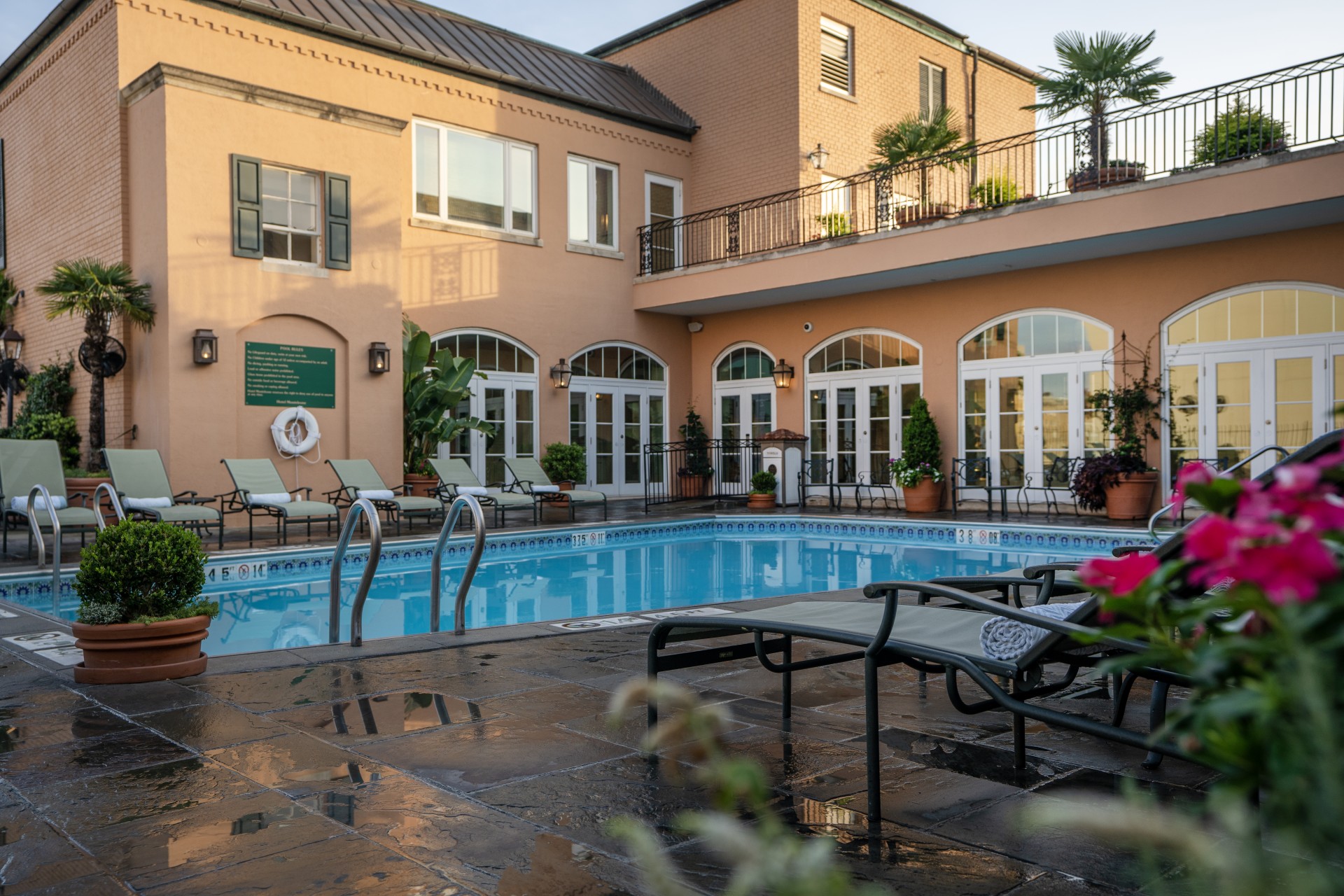 a pool in front of a building