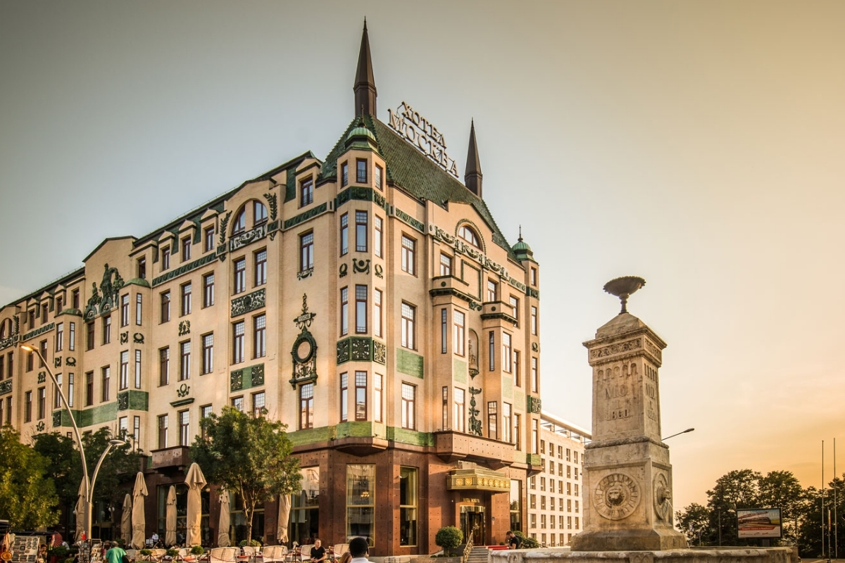 a building with a statue in front of it