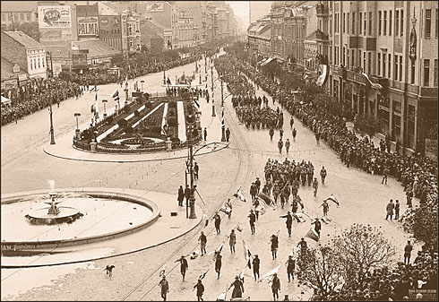 a group of people marching in a street