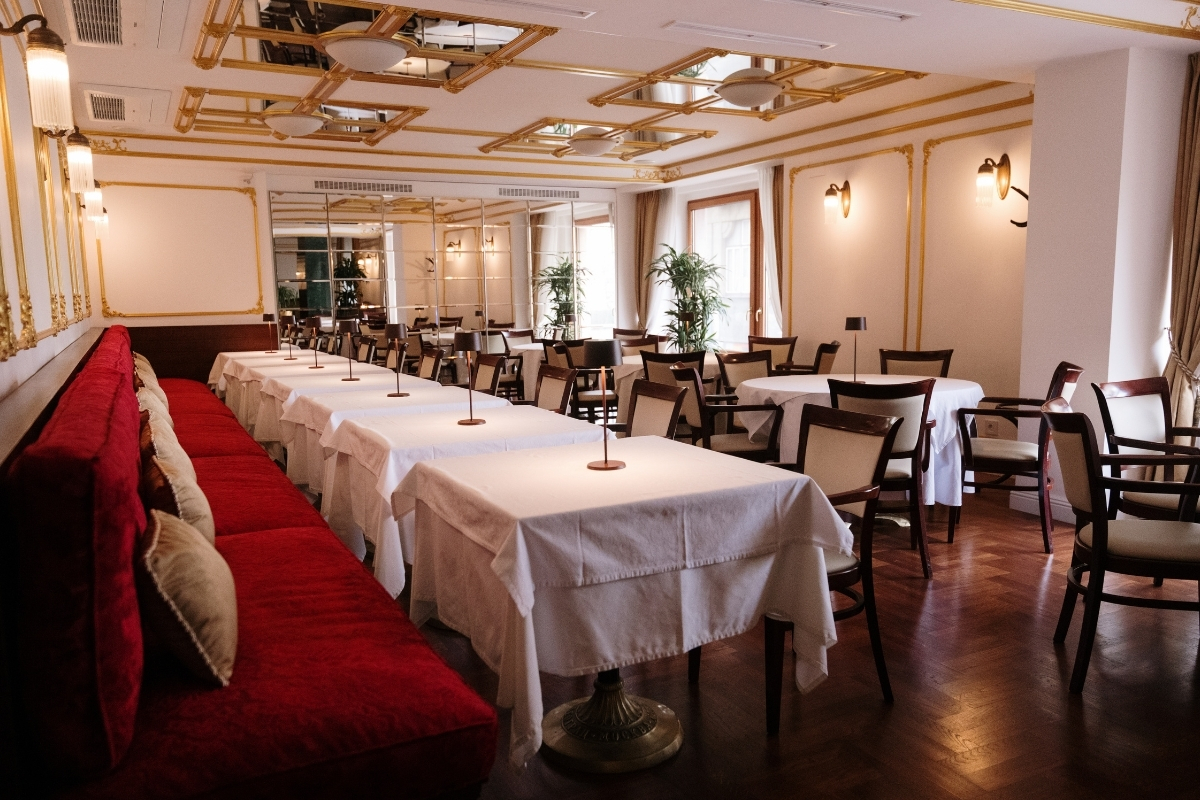 a room with tables and chairs