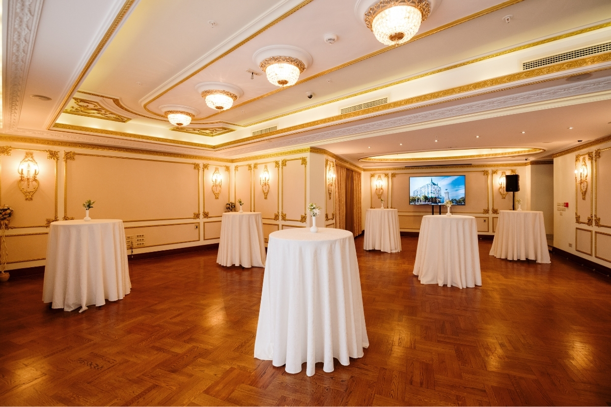 a room with tables and chairs