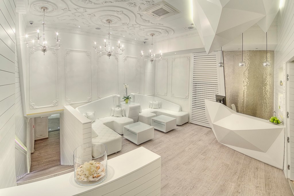 a white room with white furniture