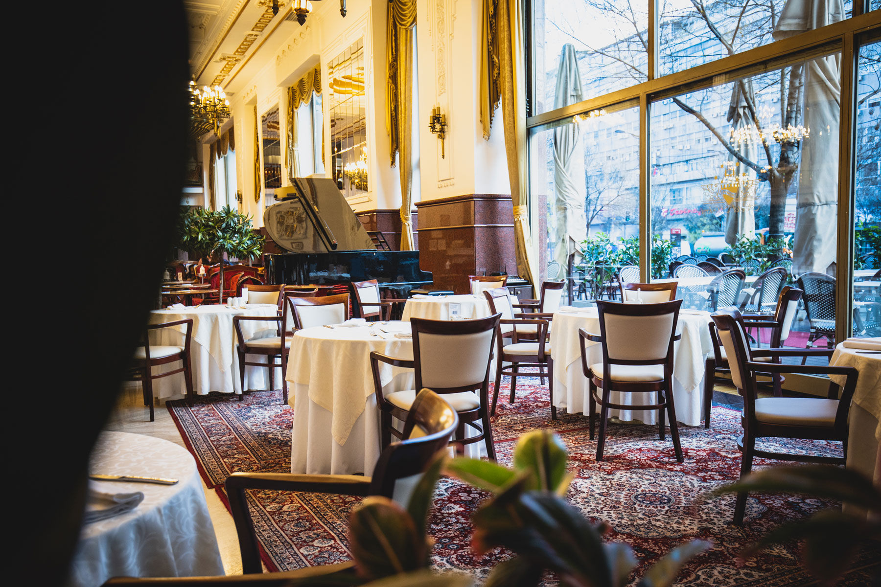 a room with tables and chairs