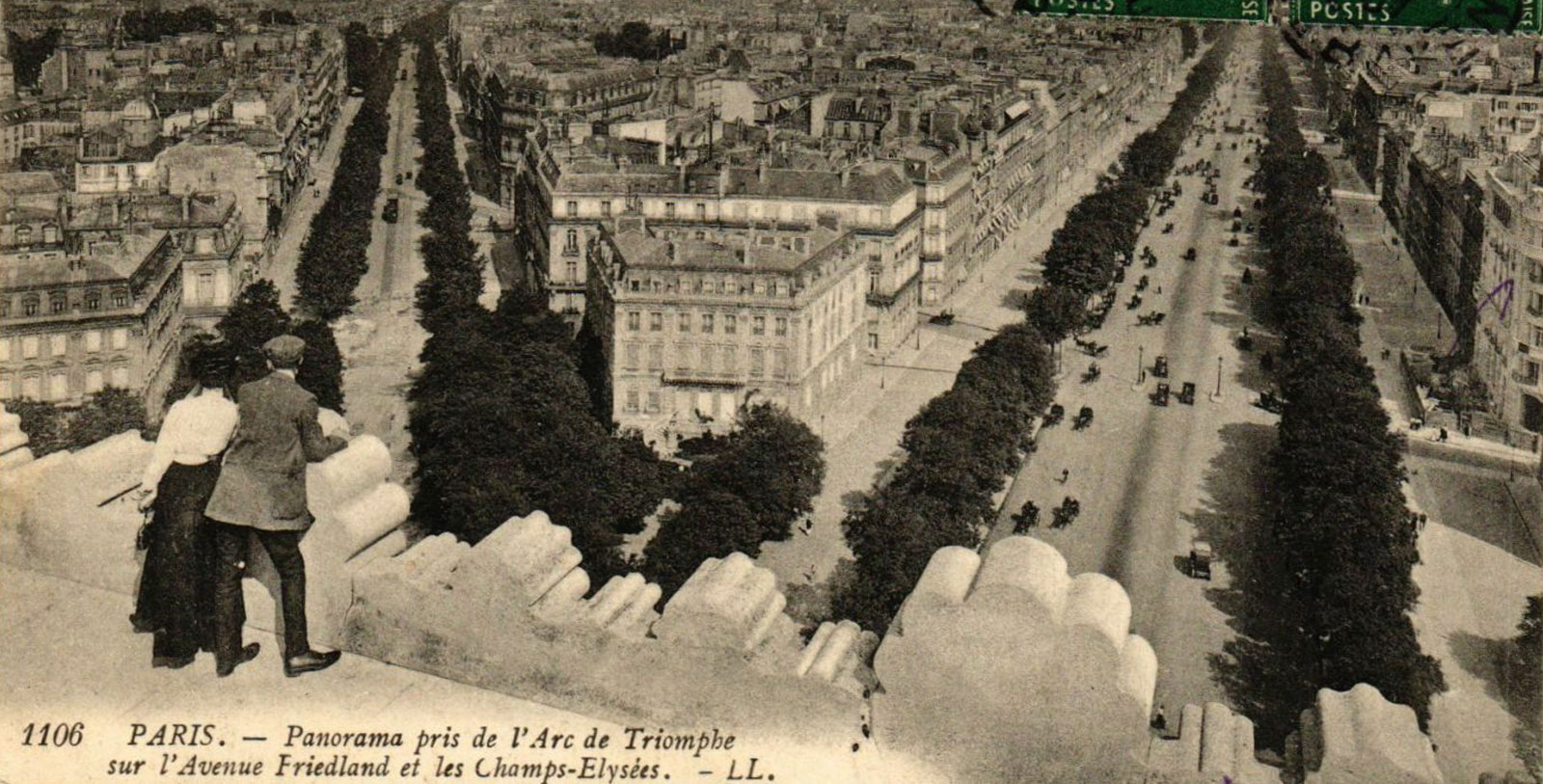 a view of a street and a city from a high point