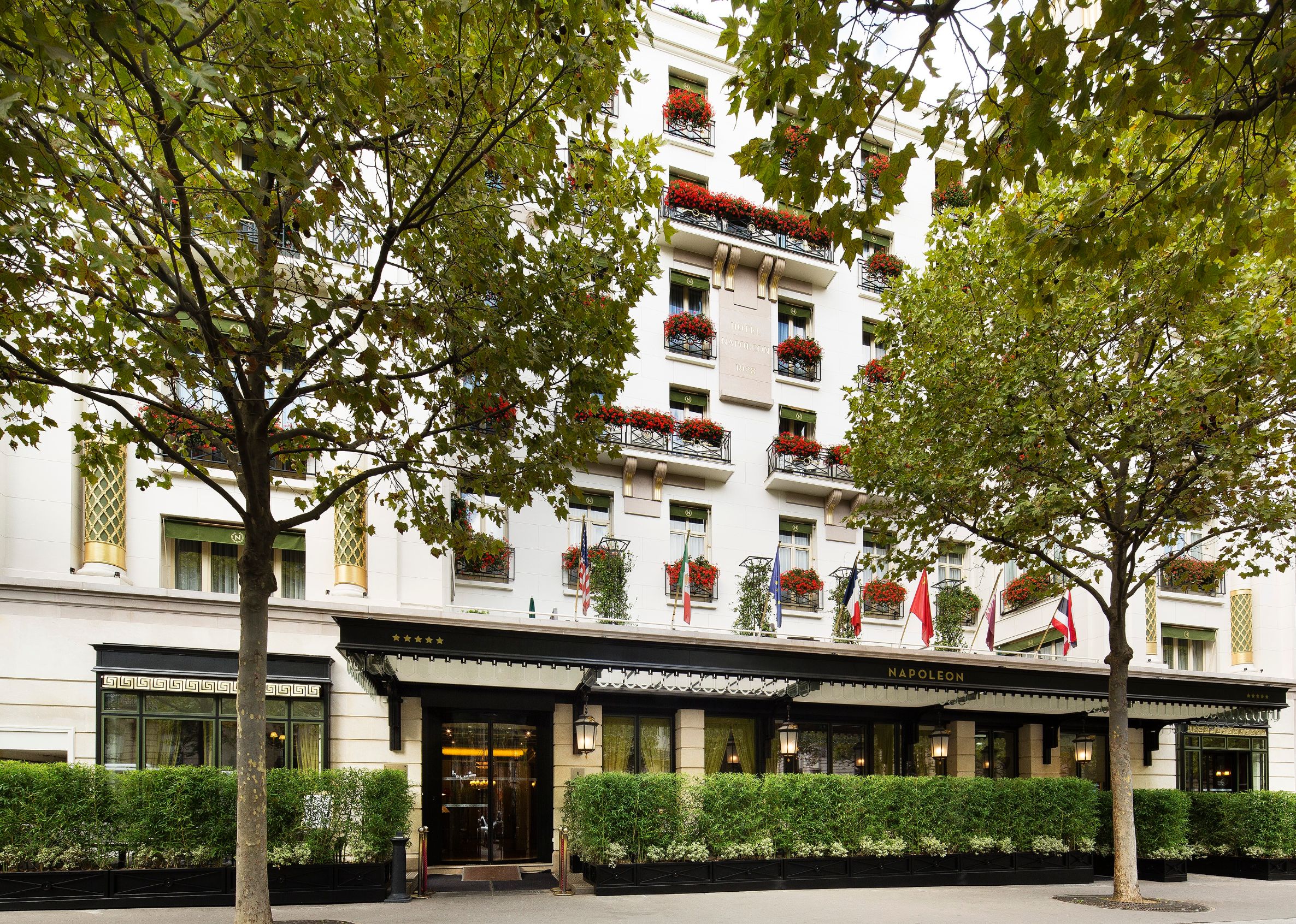 a building with trees and plants