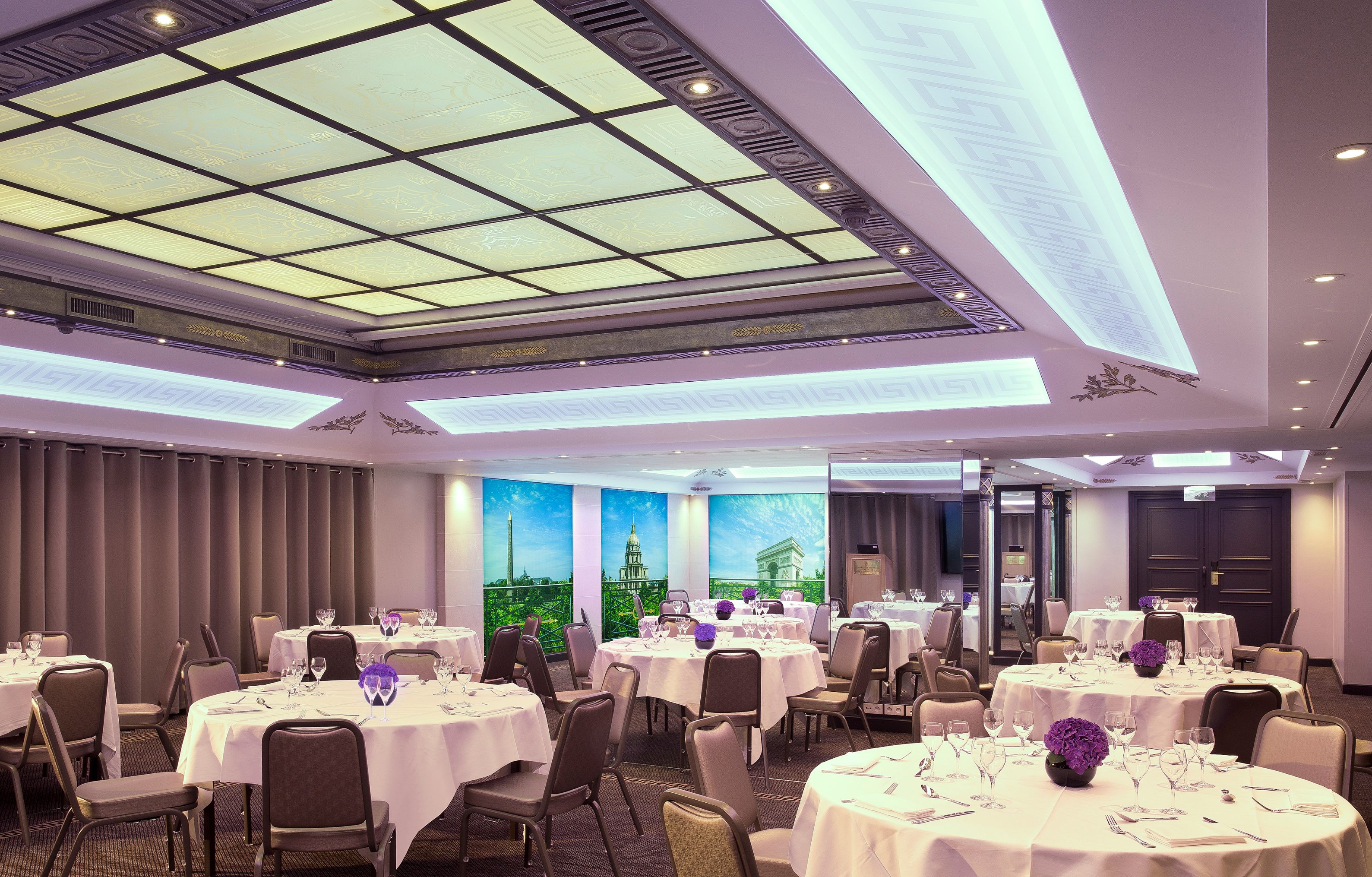a room with tables and chairs