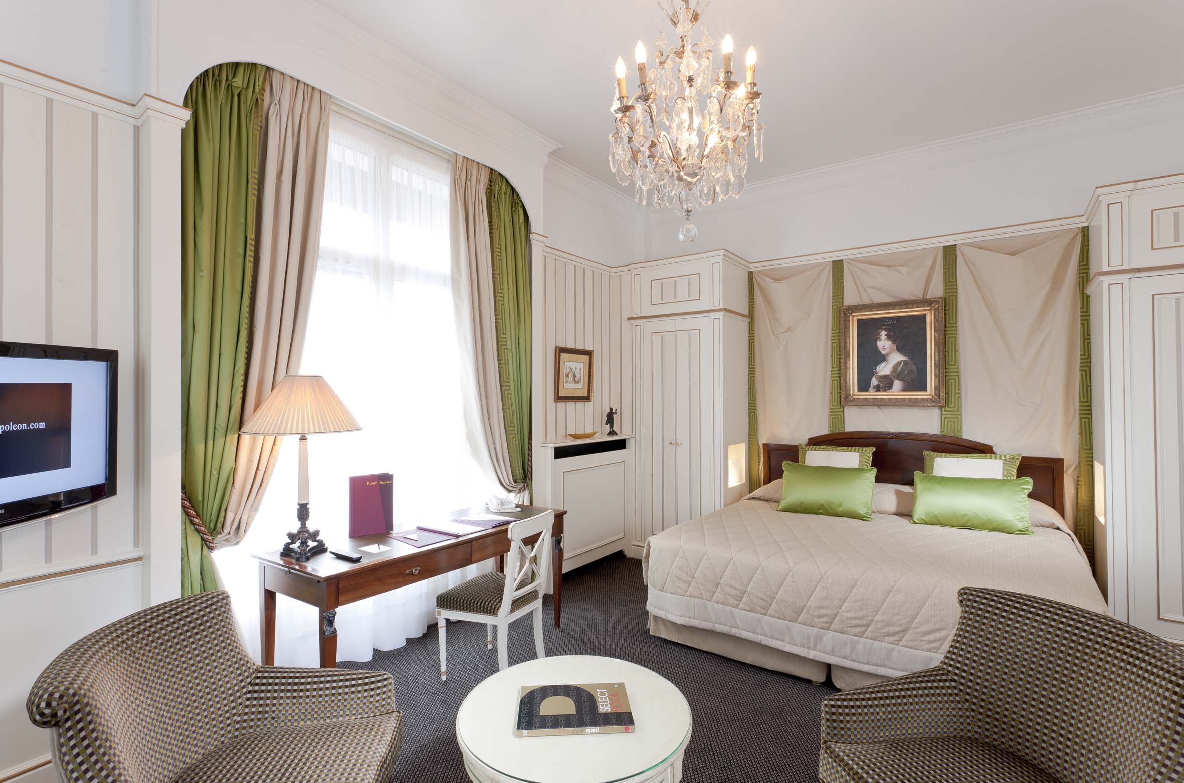 a room with a bed and a desk