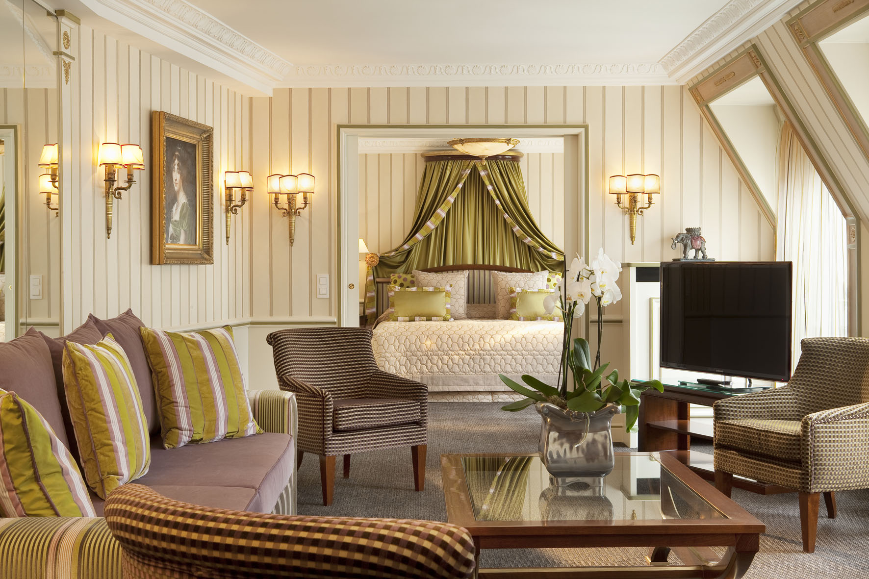 a room with a television and a bed