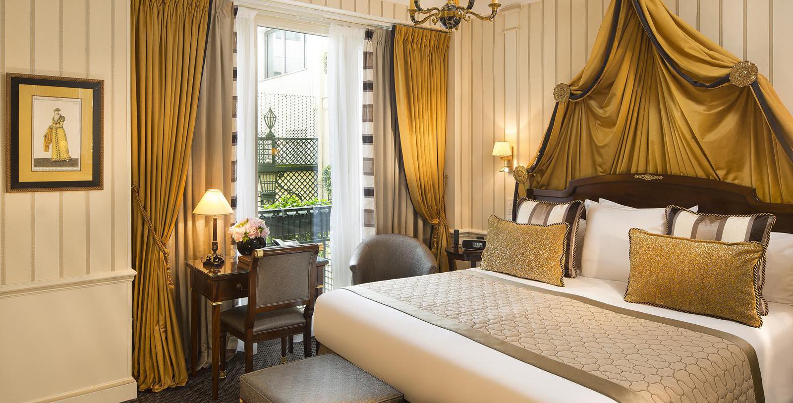 a bedroom with a bed and a table