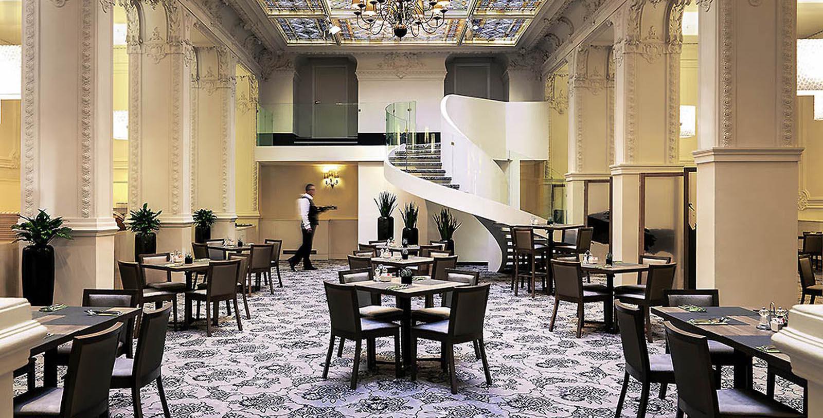 a man walking in a restaurant
