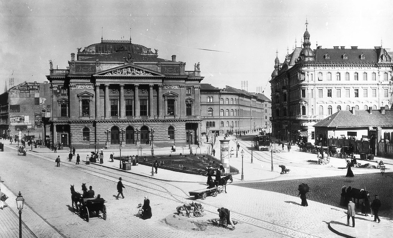 a large building with a large building in the background