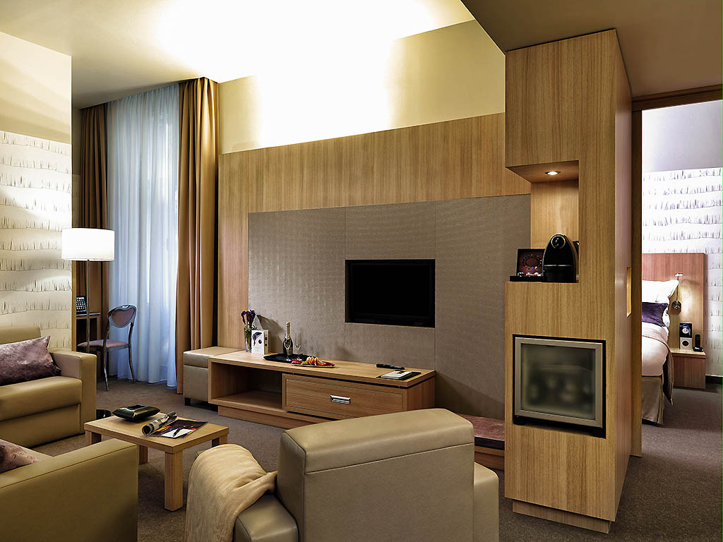 a room with a television and a tv