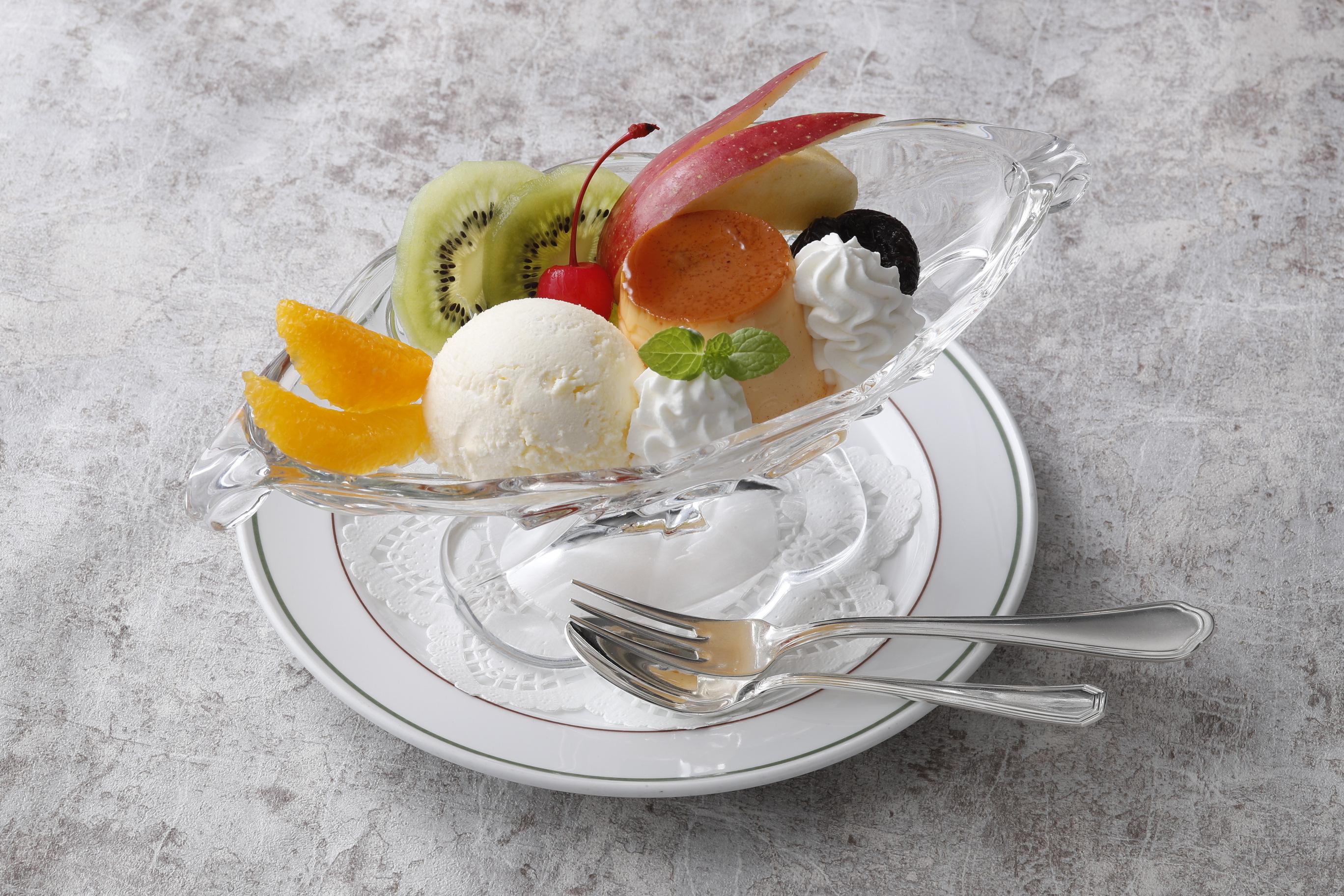 a bowl of fruit and ice cream