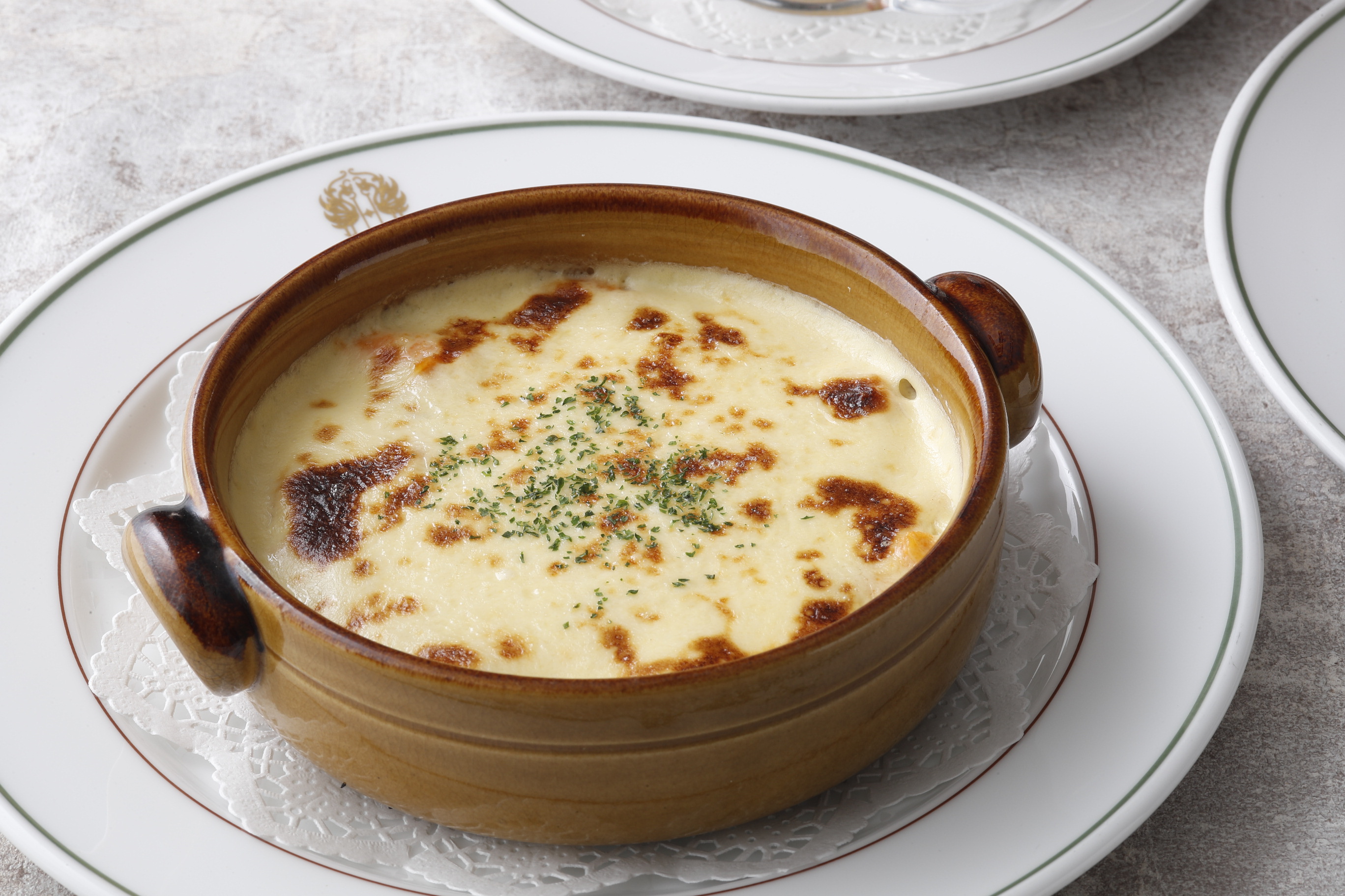 a bowl of soup on a plate