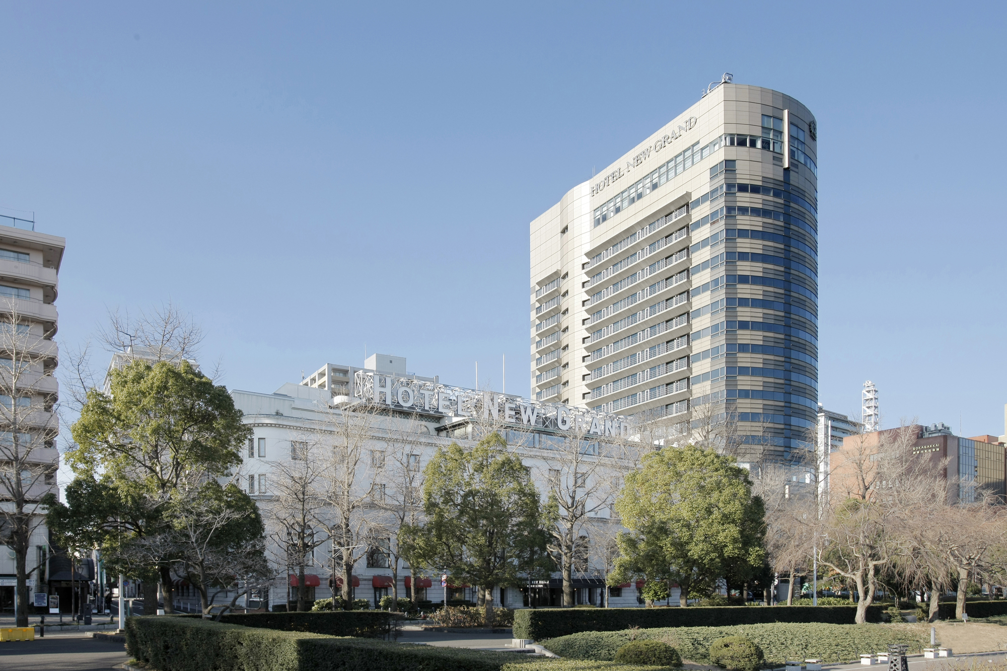 a building with trees and bushes