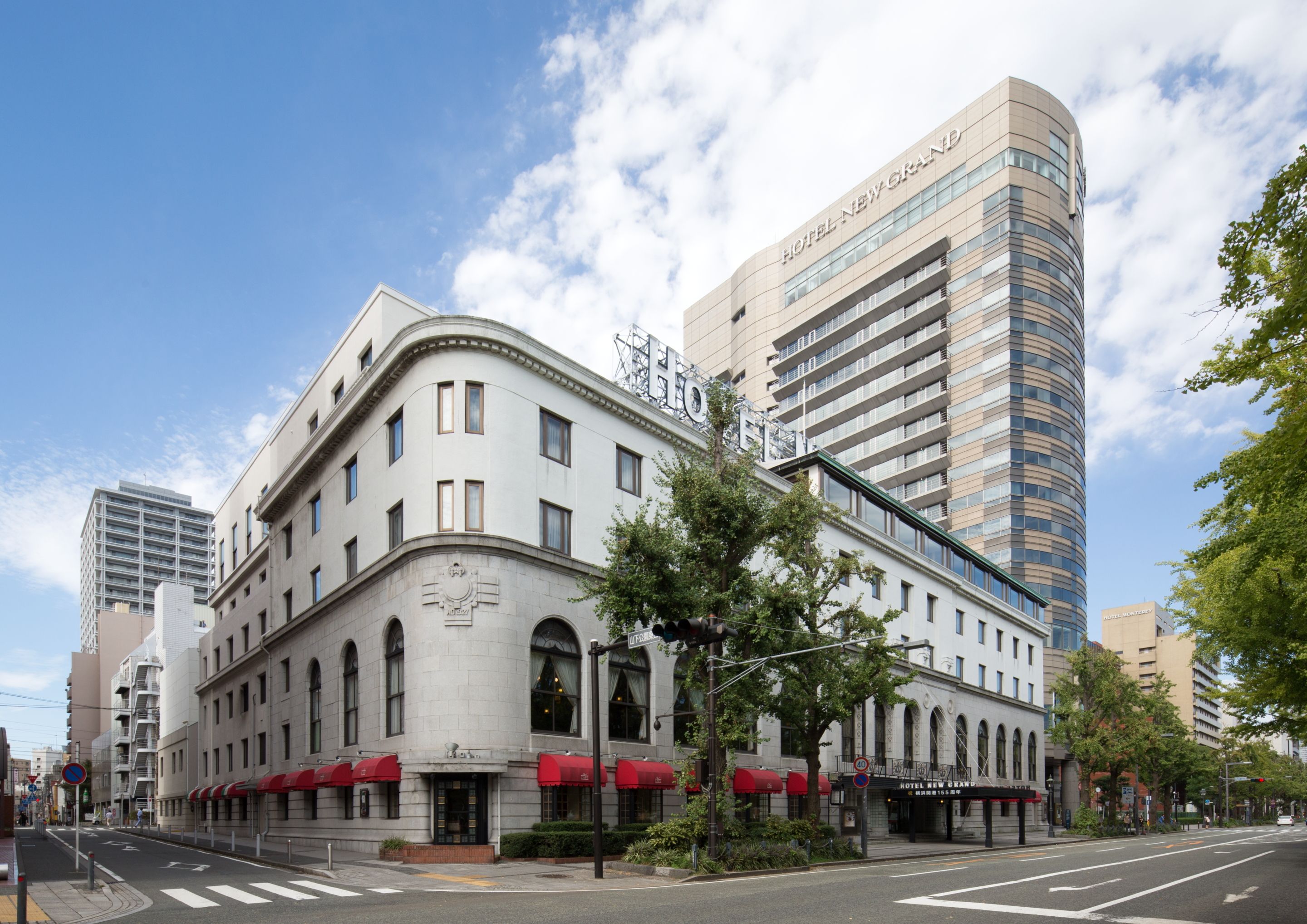 a building with a street corner and a large building