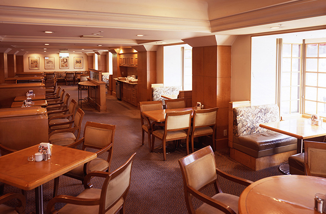 a restaurant with tables and chairs