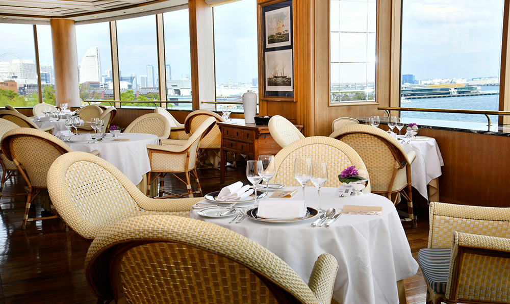a restaurant with tables and chairs