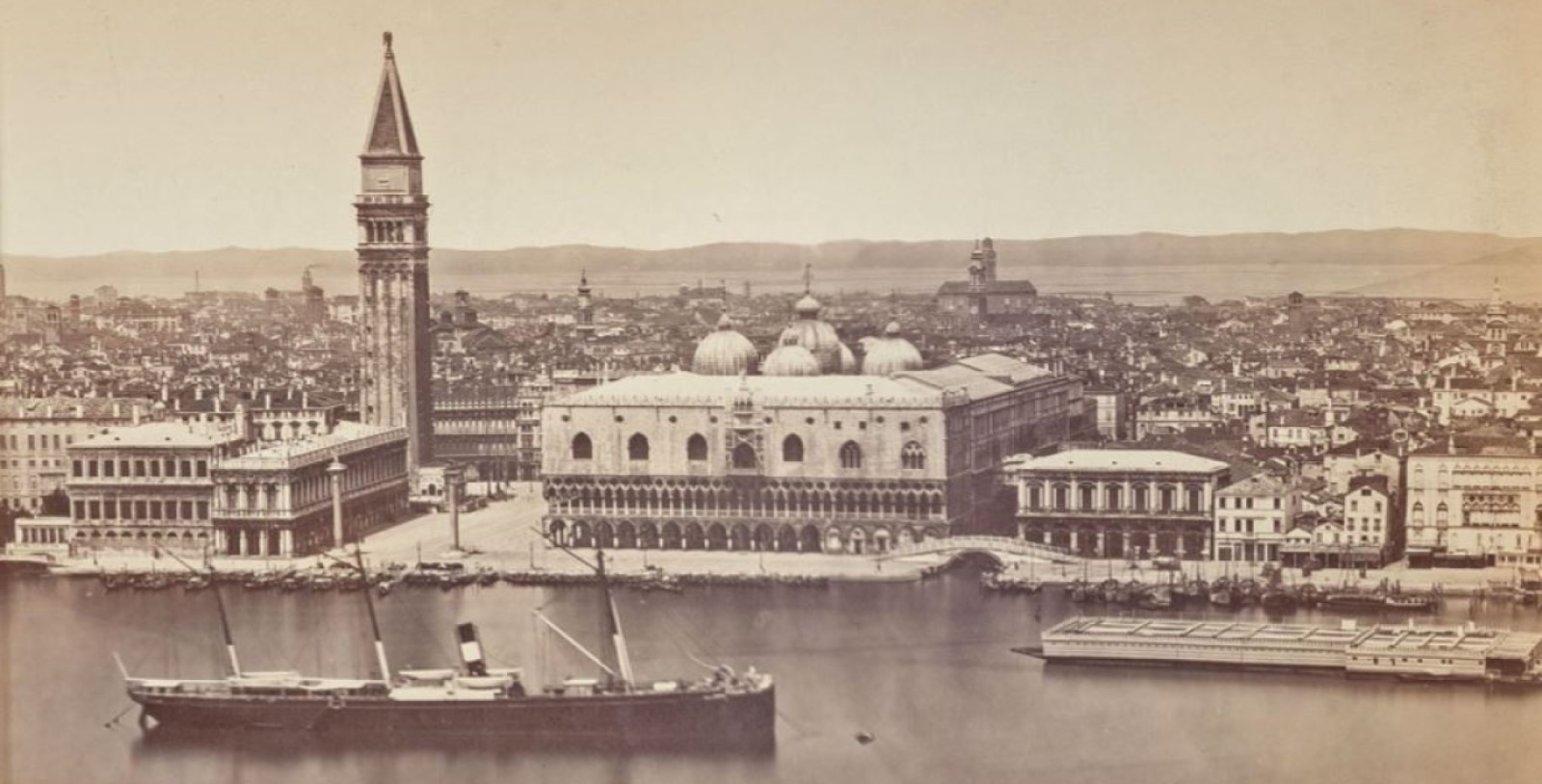 a large building next to a body of water