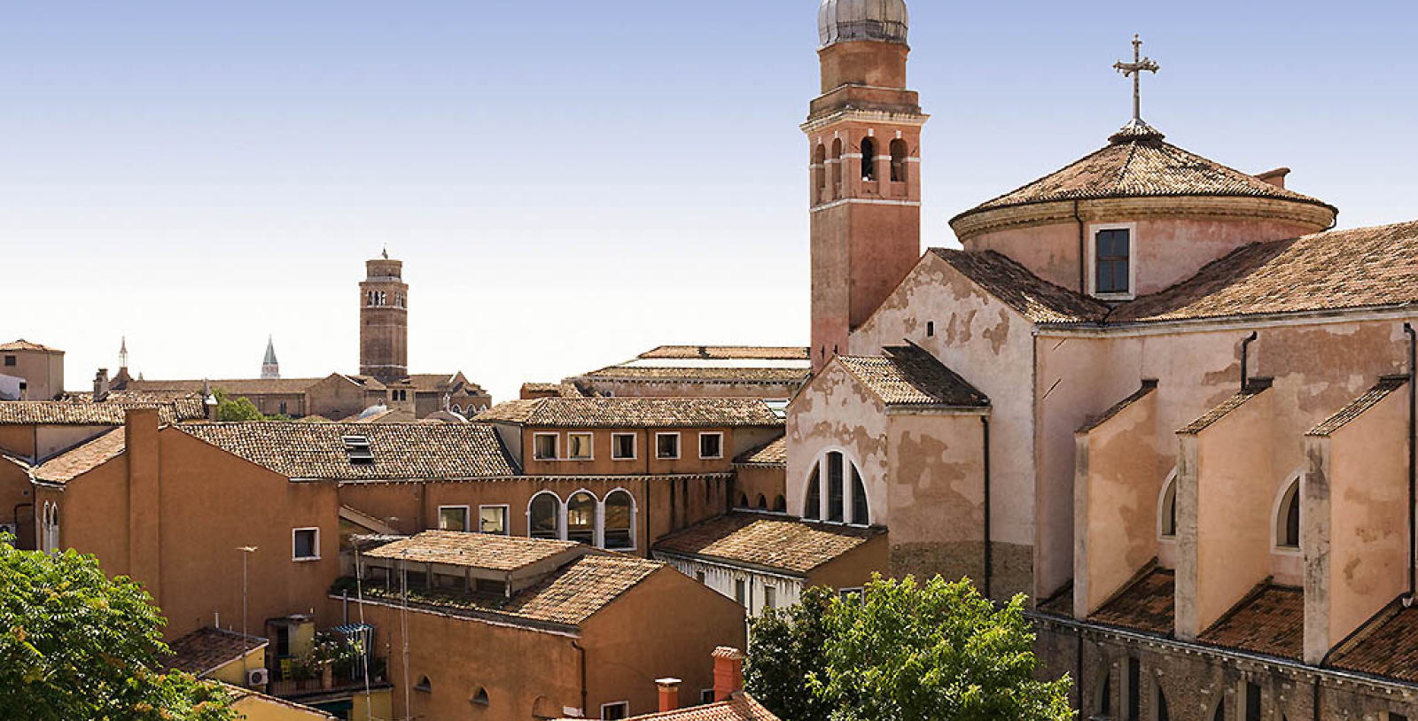a group of buildings with a tower