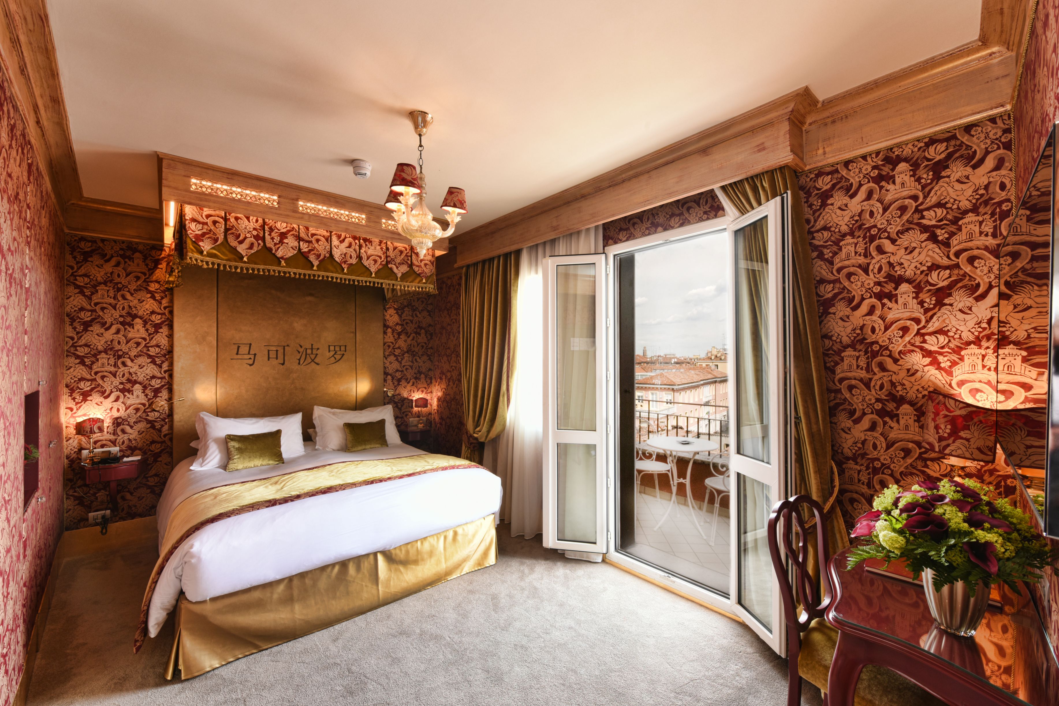 a bedroom with a bed and a glass door
