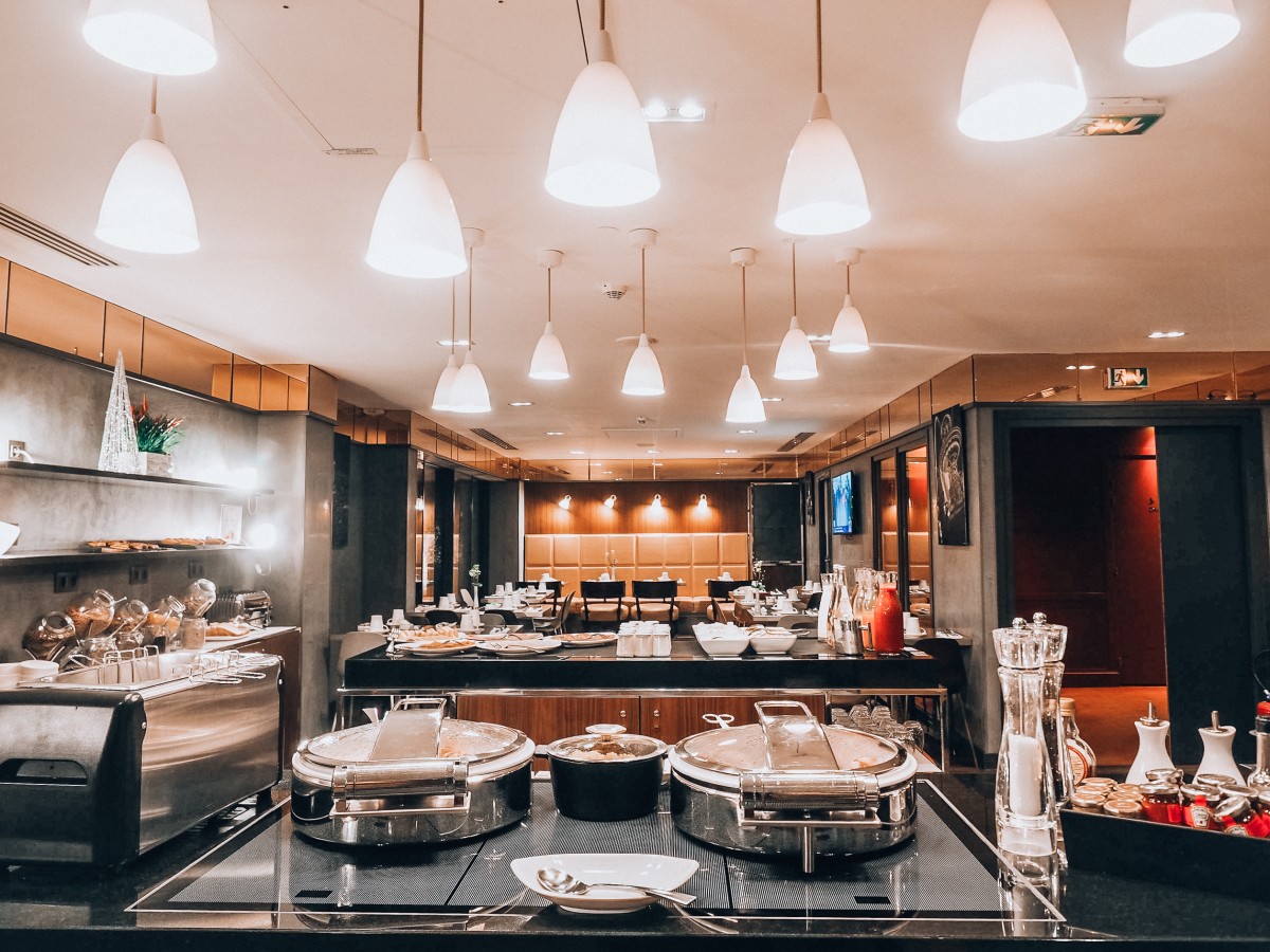 a kitchen with many pots and utensils
