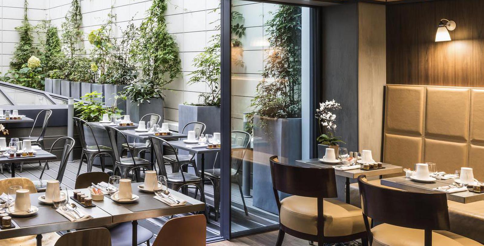 a restaurant with tables and chairs