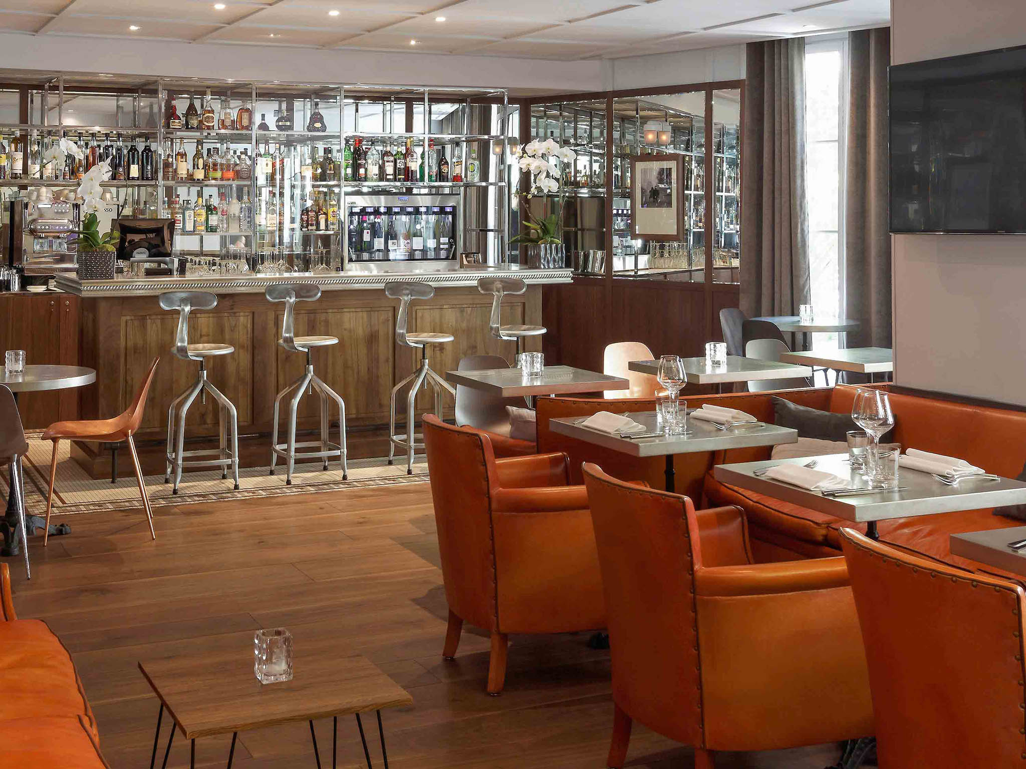 a restaurant with tables and chairs