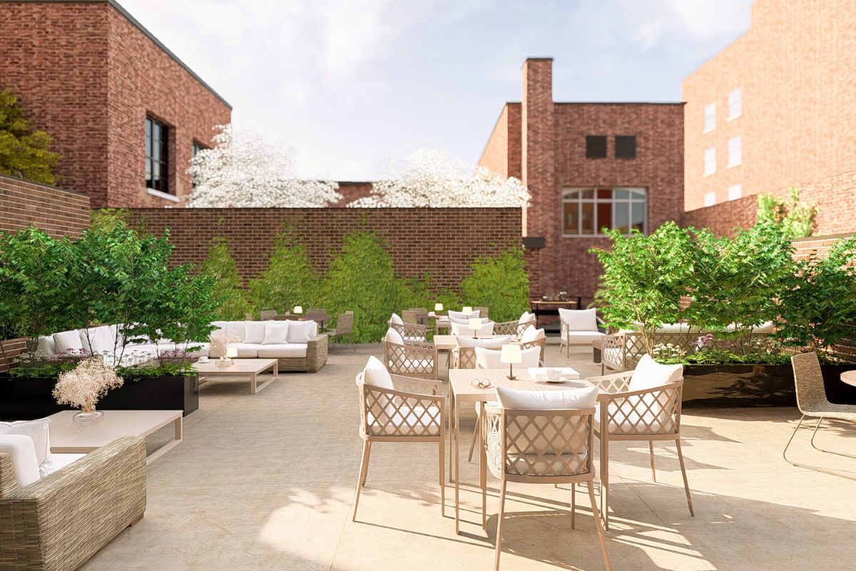 a patio with chairs and tables