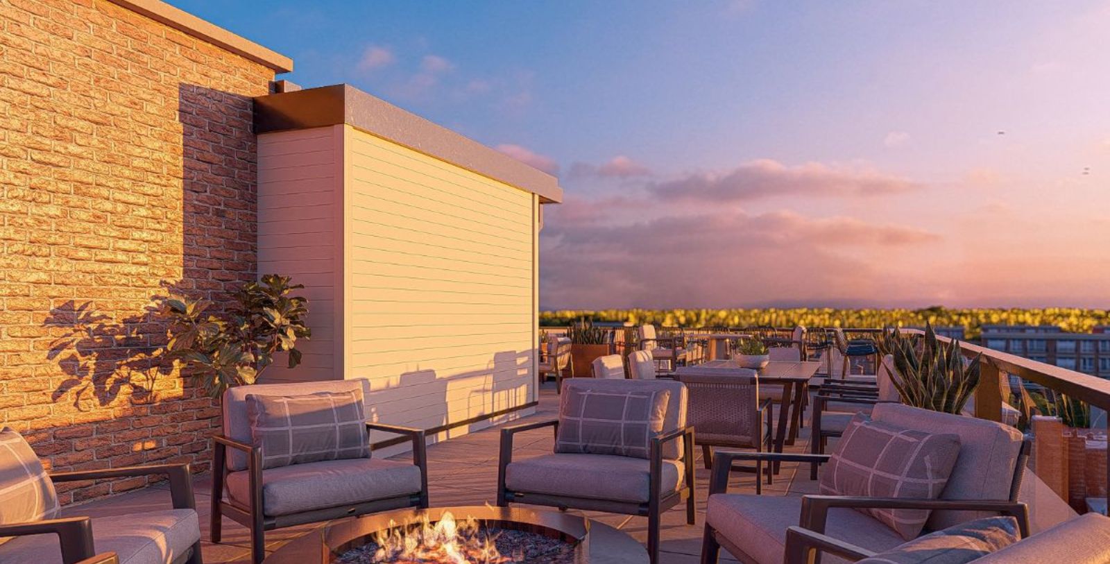 a patio with chairs and a fire pit