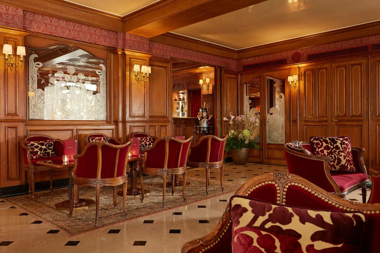 a room with chairs and tables