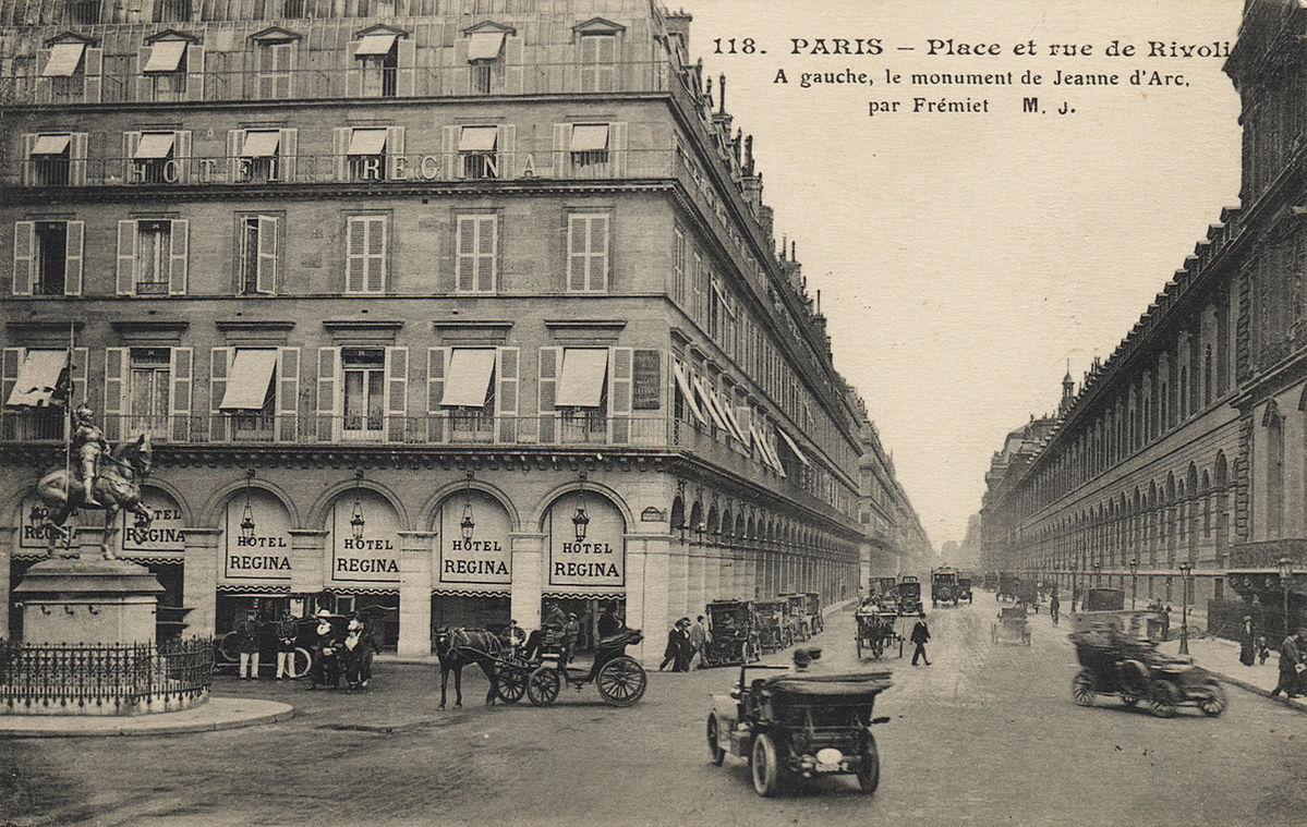 a horse drawn carriage on a street