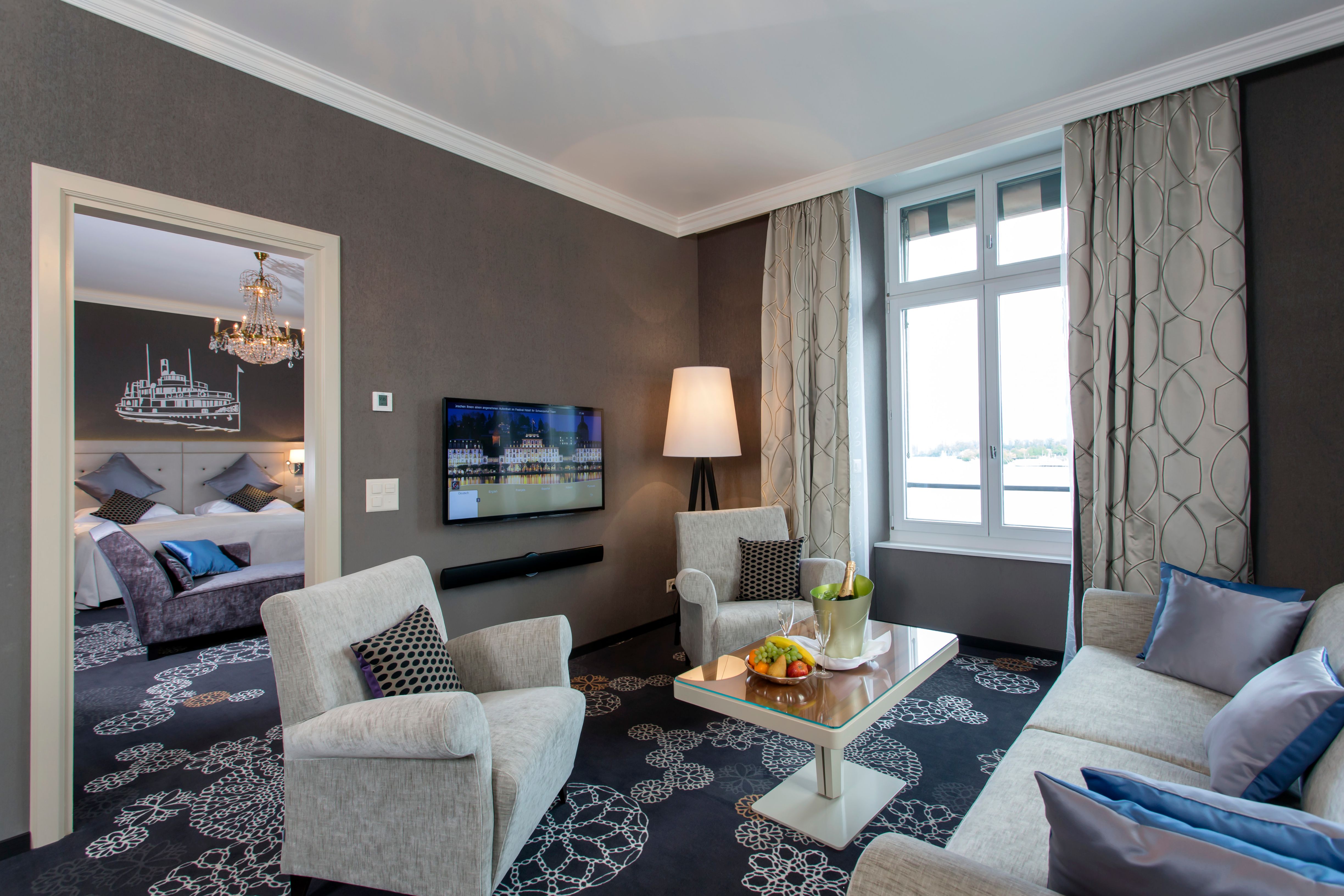 a room with a television and couches