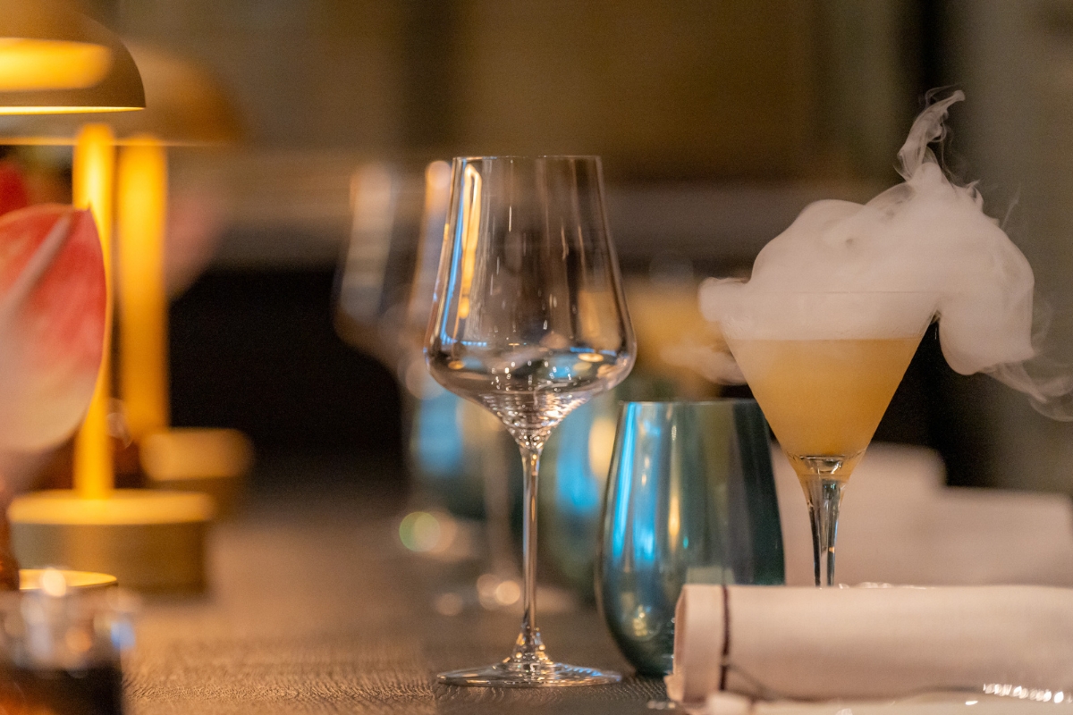 a group of wine glasses on a table