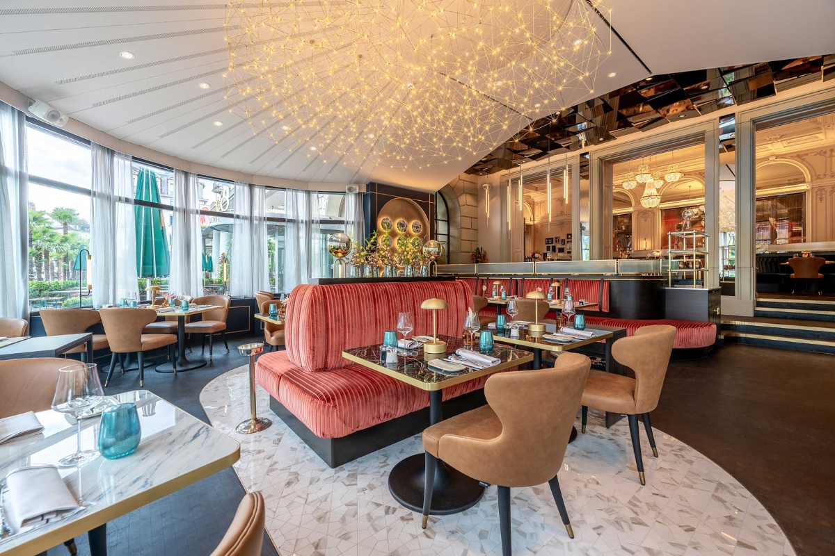 a restaurant with a chandelier