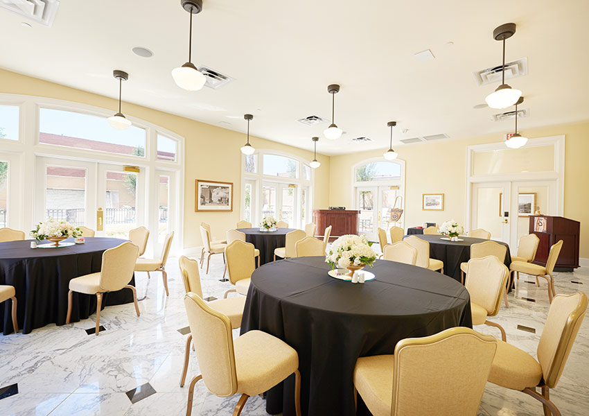 a room with tables and chairs
