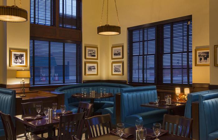 a restaurant with tables and chairs