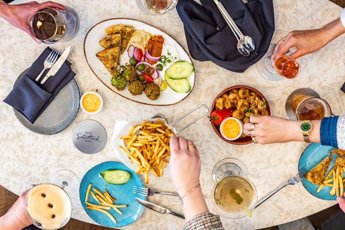 a group of people eating at a table