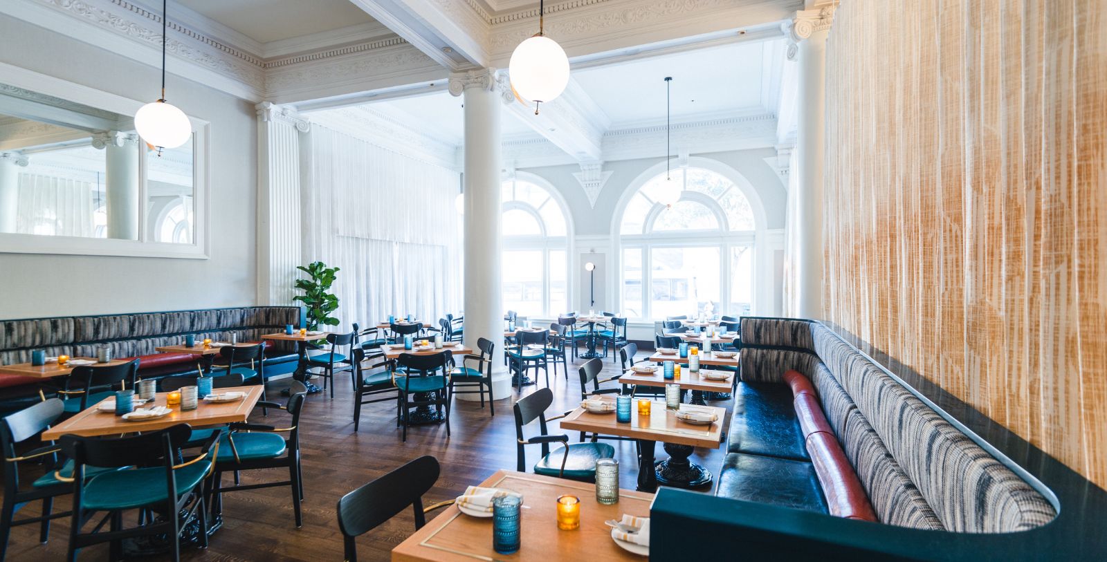 a restaurant with tables and chairs